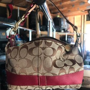 Brown and red Coach signature stripe mini purse